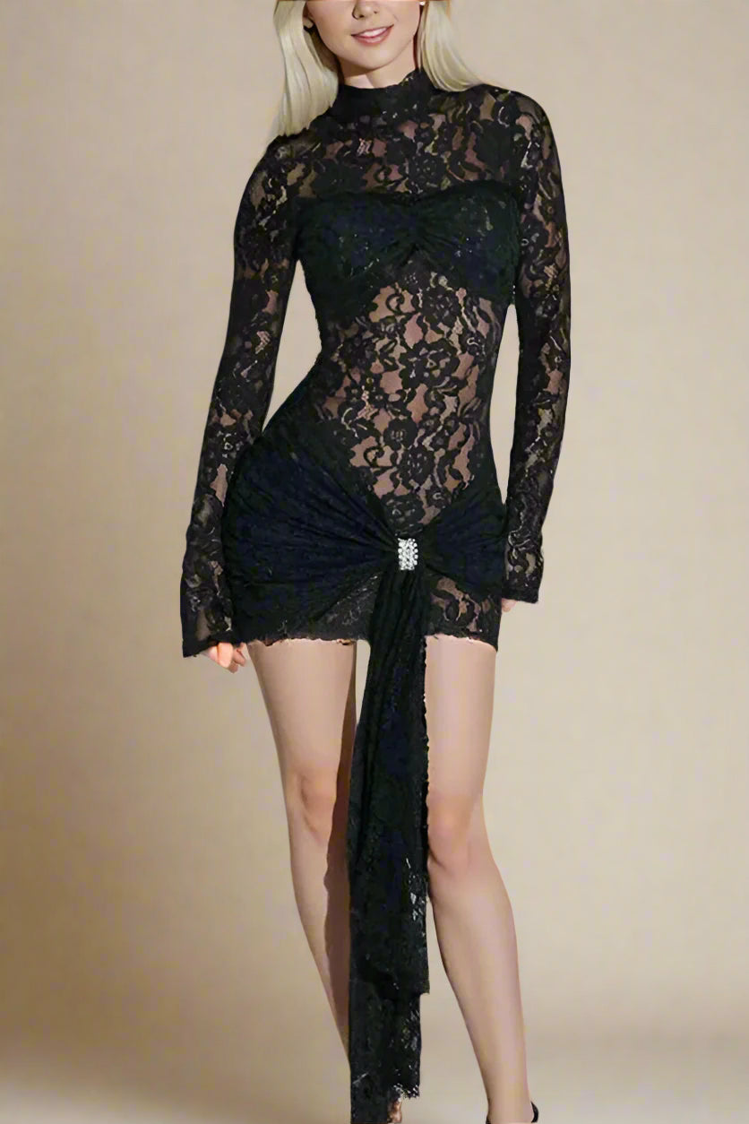 Woman wearing a figure flattering  Andie Long Sleeve Bodycon Wrap Mini Dress - Classic Black BODYCON COLLECTION