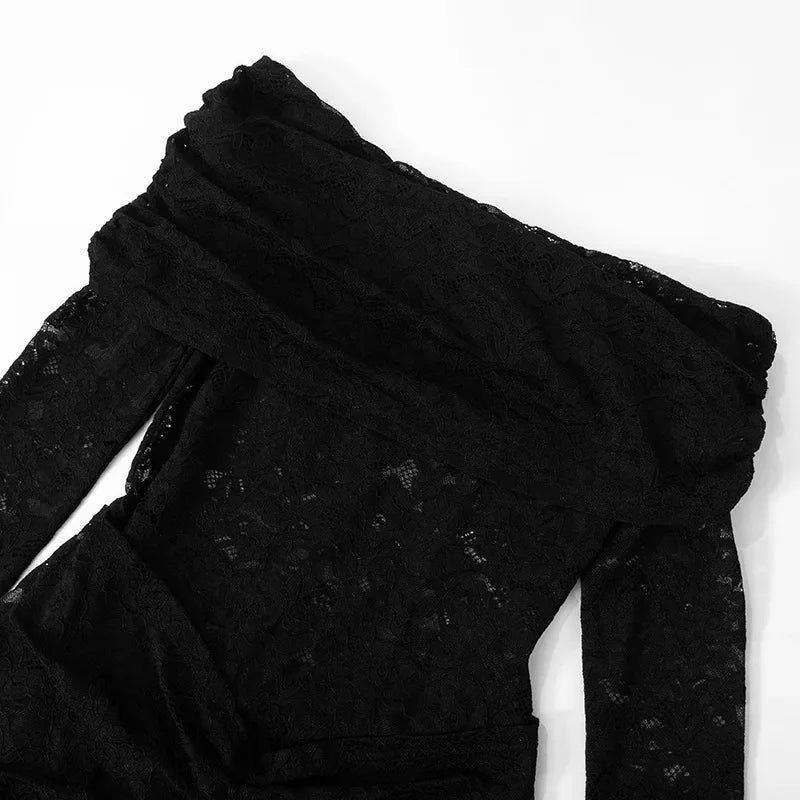 Woman wearing a figure flattering  Andie Long Sleeve Lace jumpsuit - Classic Black BODYCON COLLECTION