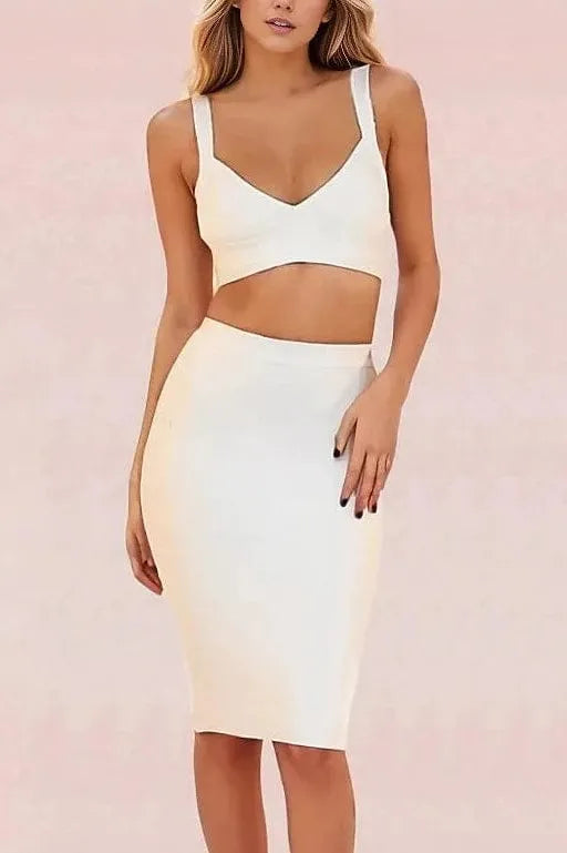 Woman wearing a figure flattering  Ang Bandage Top and Knee Length Skirt Set - Pearl White BODYCON COLLECTION