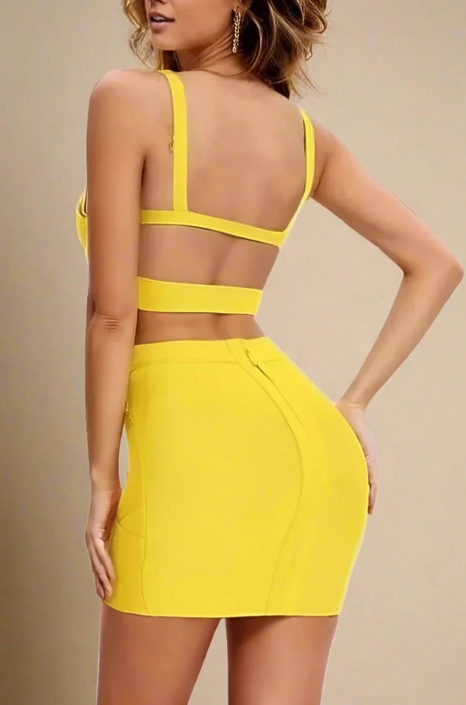 Woman wearing a figure flattering  Ang Bandage Top and Mini Skirt Set - Sun Yellow BODYCON COLLECTION