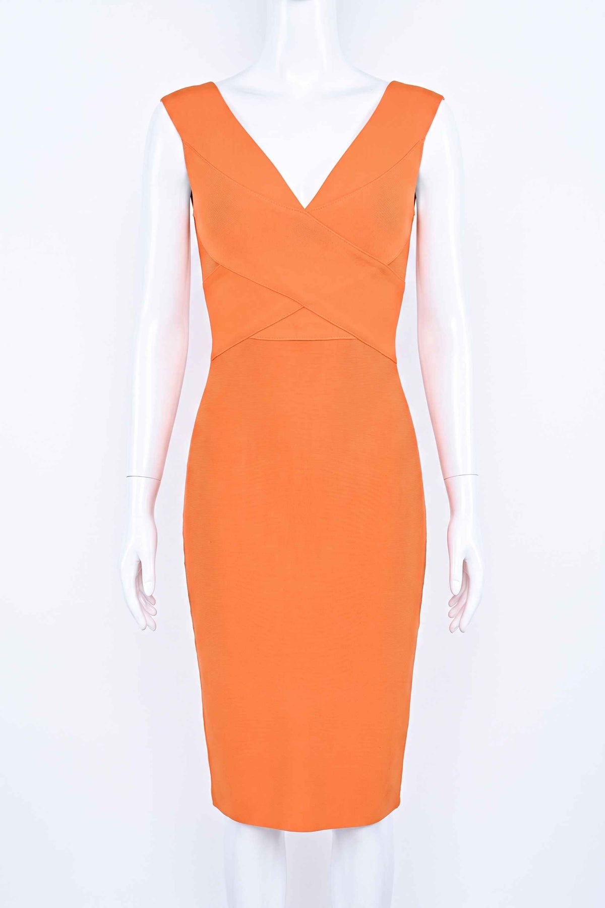 Woman wearing a figure flattering  Ash Bandage Dress - Apricot Orange Bodycon Collection