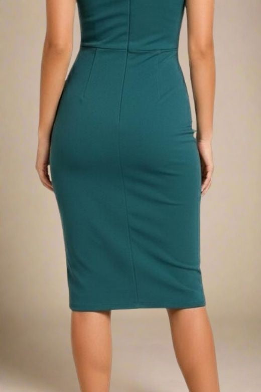 Woman wearing a figure flattering  Ash Bandage Dress - Emerald Green Bodycon Collection