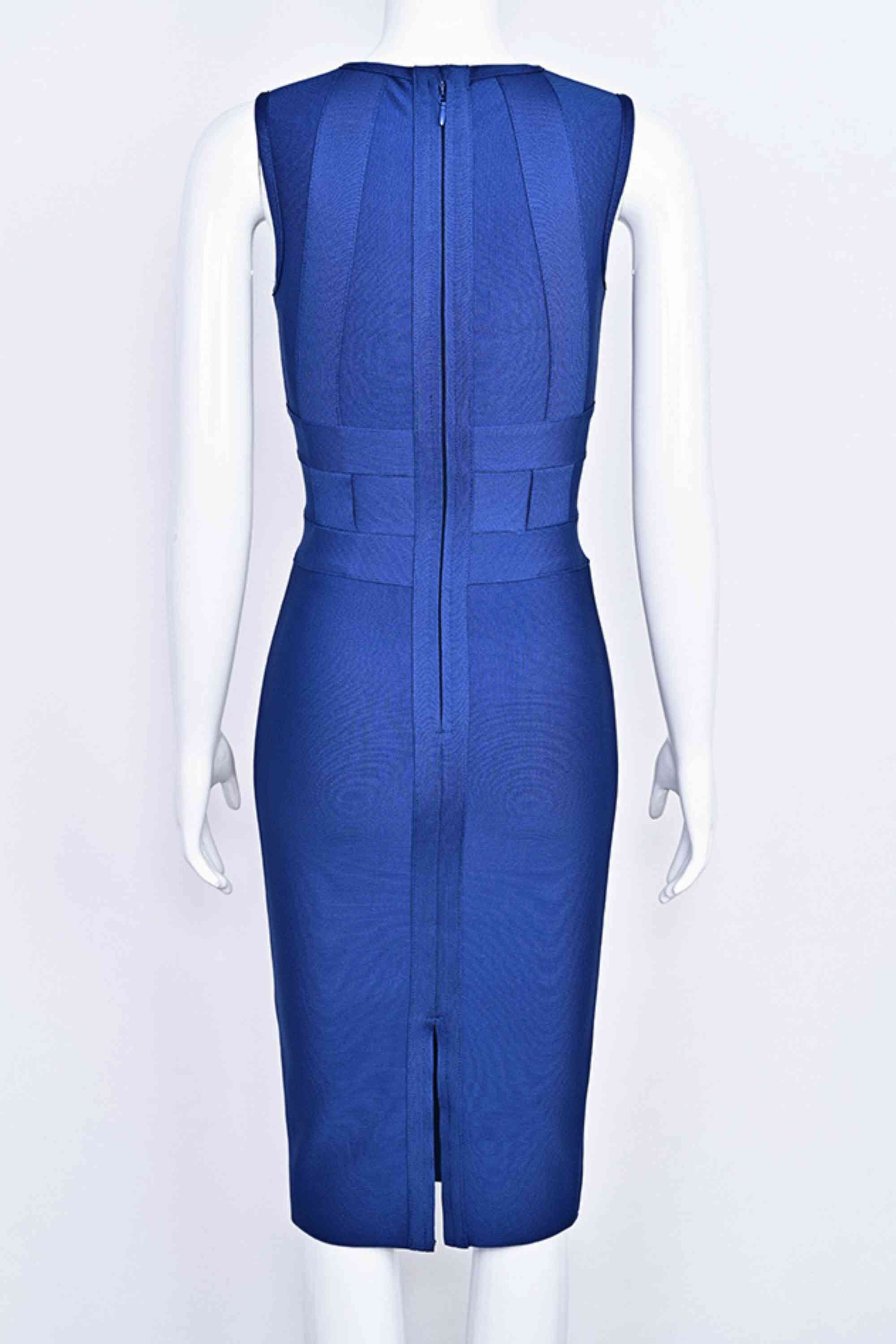 Woman wearing a figure flattering  Aurora Bandage Dress - Navy Blue BODYCON COLLECTION Pty Ltd
