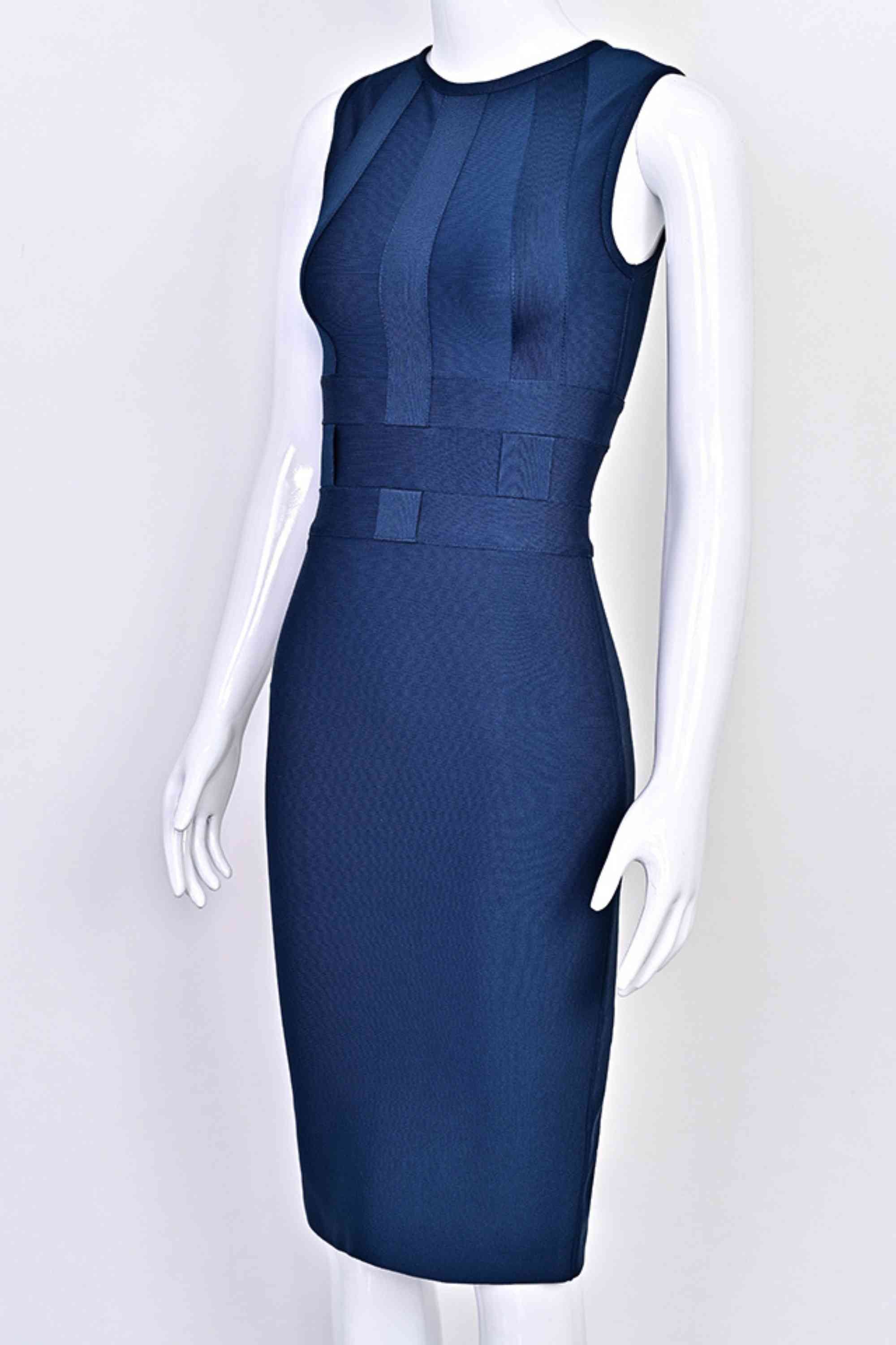 Woman wearing a figure flattering  Aurora Bandage Dress - Navy Blue BODYCON COLLECTION Pty Ltd
