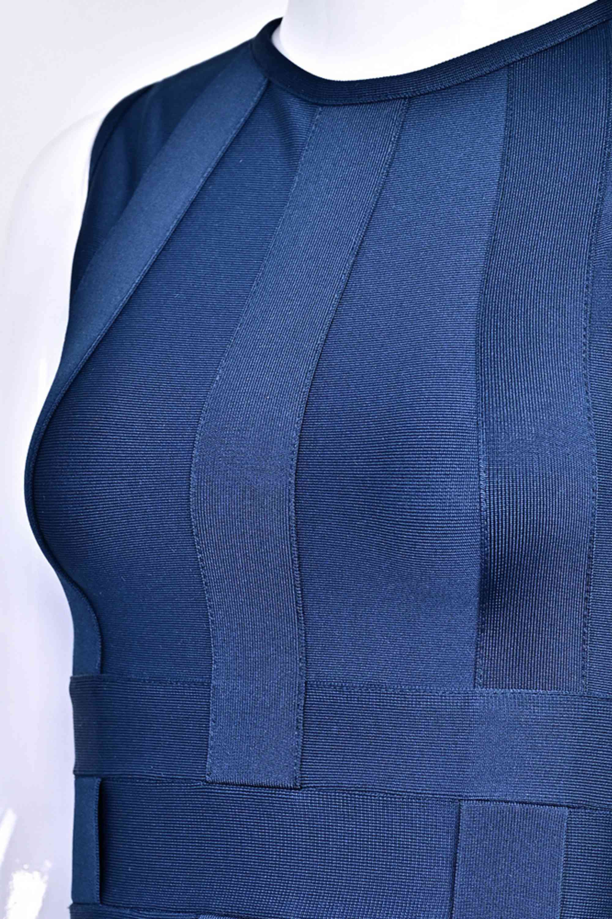 Woman wearing a figure flattering  Aurora Bandage Dress - Navy Blue BODYCON COLLECTION Pty Ltd