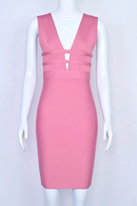 Woman wearing a figure flattering  Bay Bandage Dress - Ballet Pink Bodycon Collection