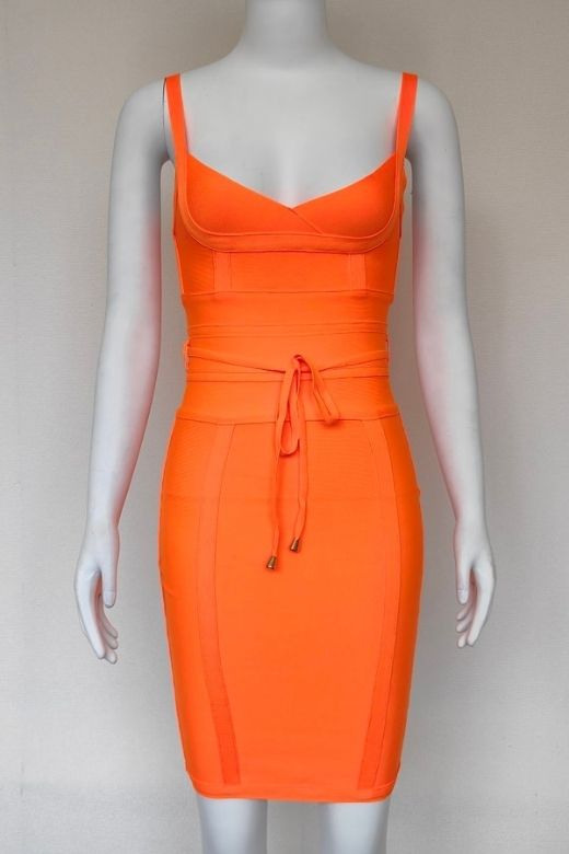 Woman wearing a figure flattering  Bek Bandage Dress - Apricot Orange Bodycon Collection