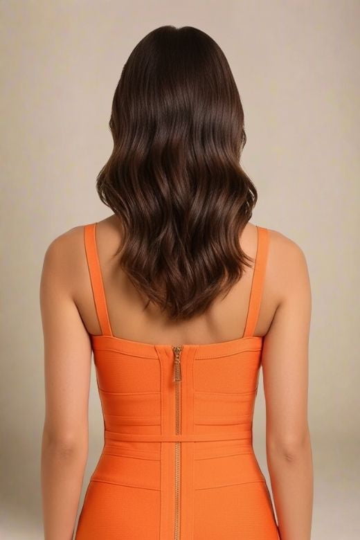 Woman wearing a figure flattering  Bek Bandage Dress - Apricot Orange Bodycon Collection