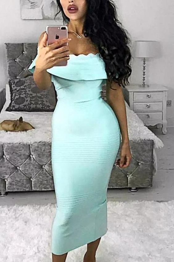 Woman wearing a figure flattering  Billie Bandage Midi Dress - Mint Green Bodycon Collection