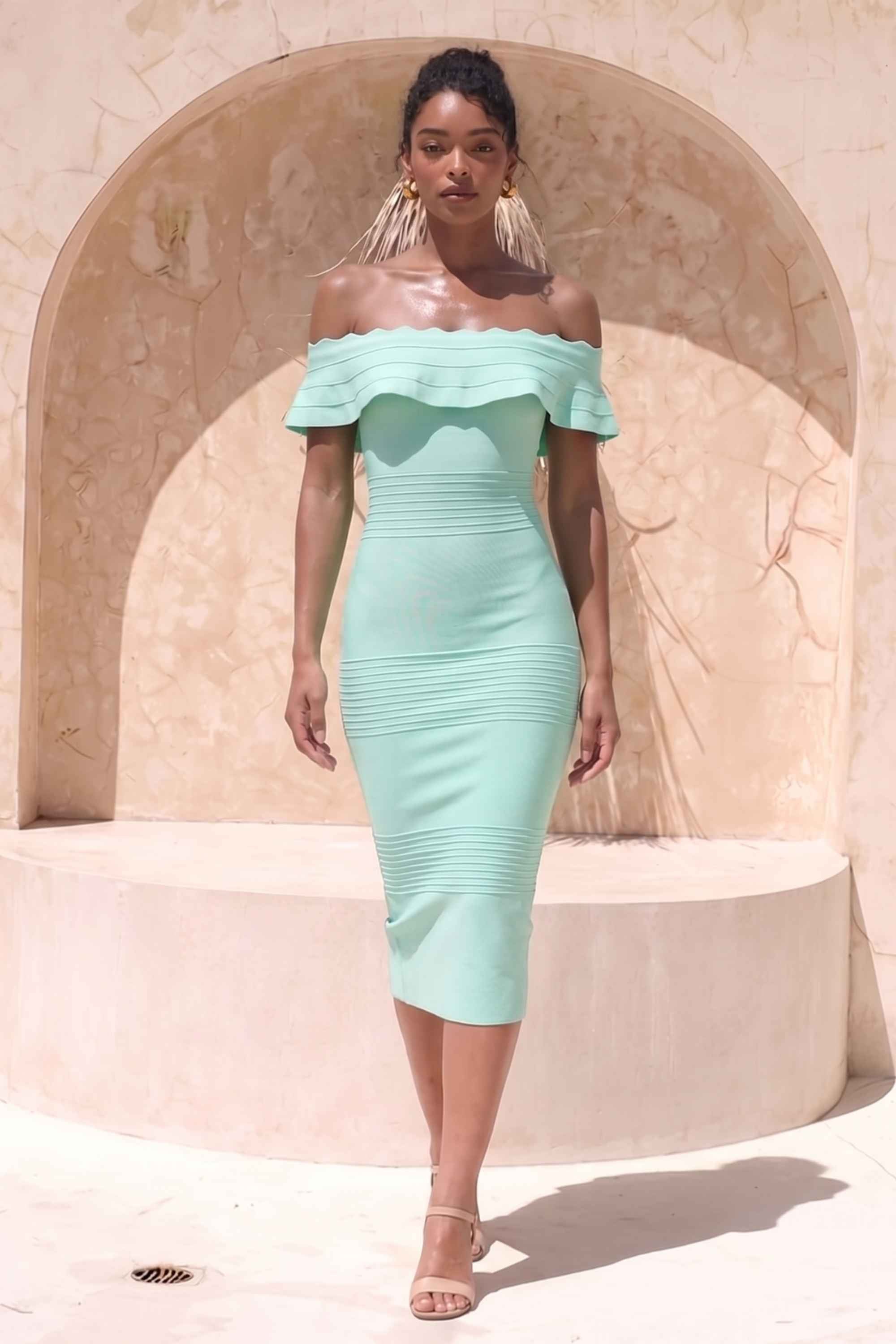 Woman wearing a figure flattering  Billie Bandage Midi Dress - Mint Green Bodycon Collection