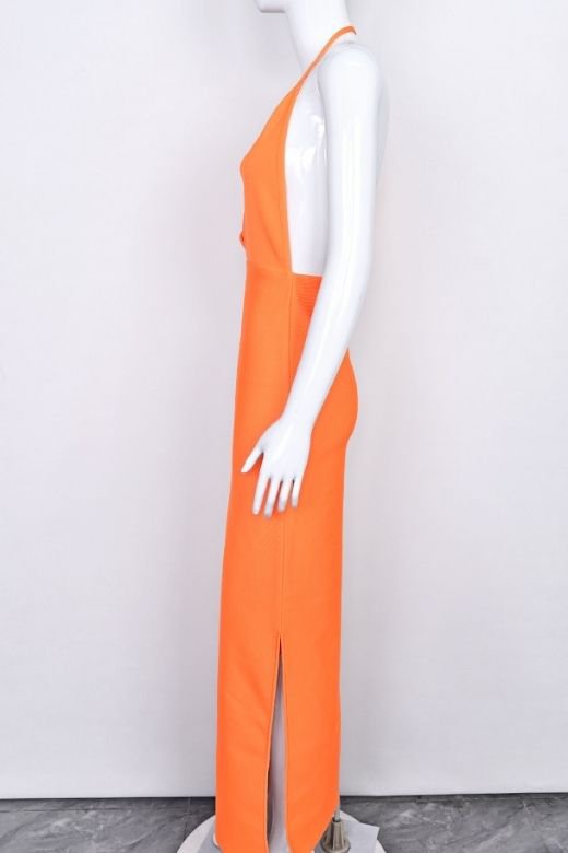 Woman wearing a figure flattering  Blake Bandage Maxi Dress - Apricot Orange BODYCON COLLECTION