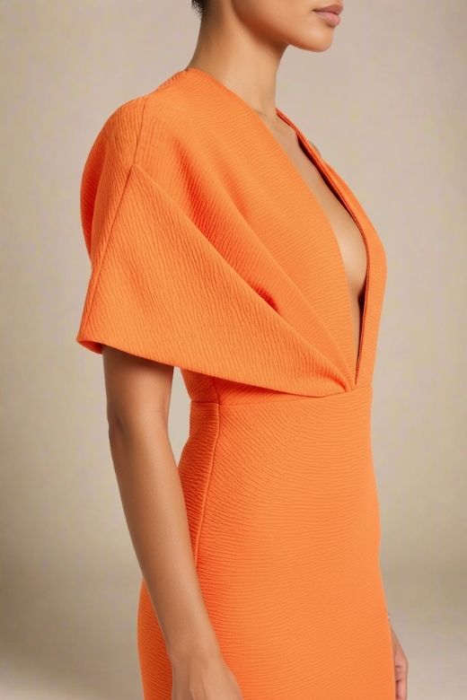 Woman wearing a figure flattering  Blake Bandage Maxi Dress - Apricot Orange BODYCON COLLECTION