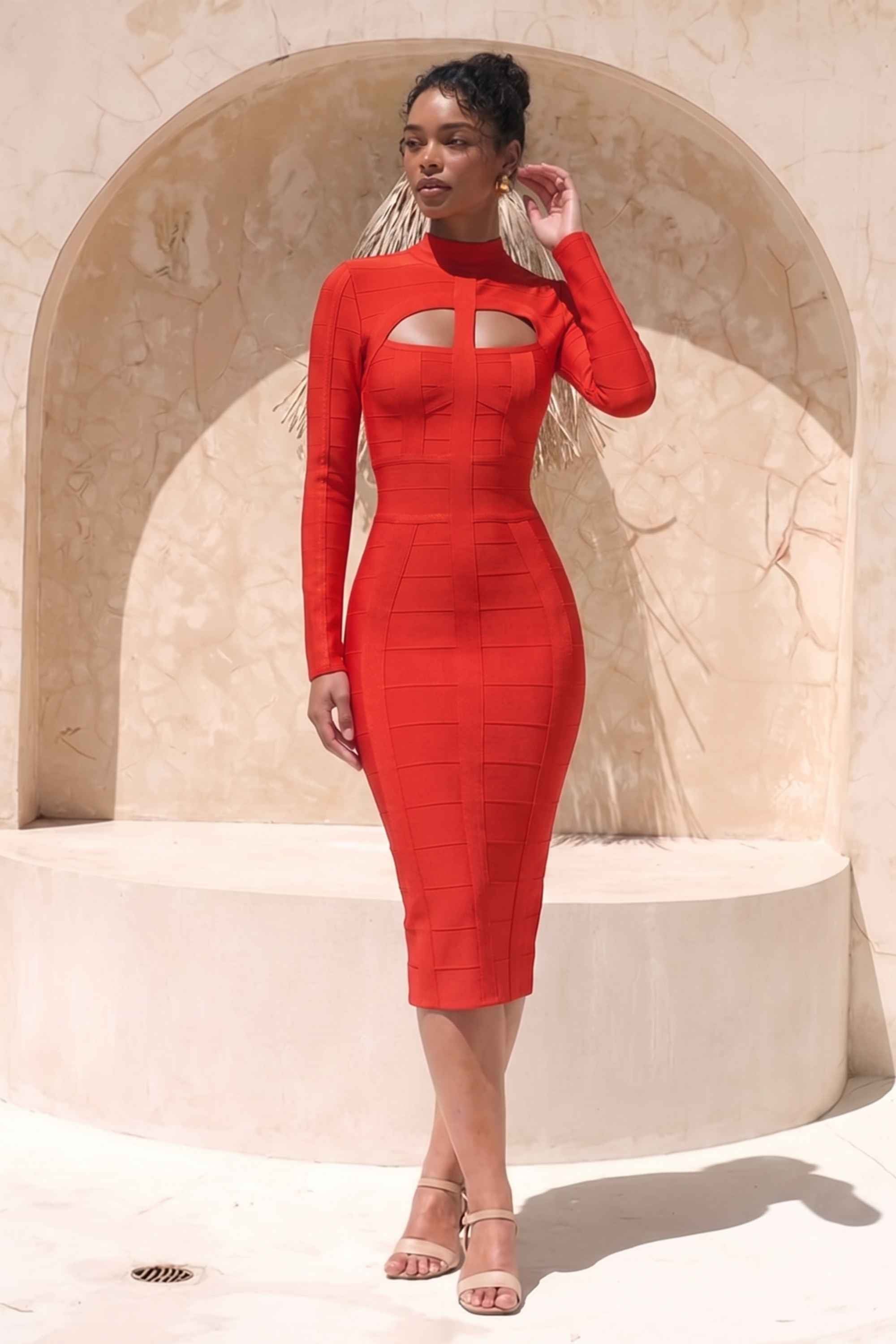 Woman wearing a figure flattering  Brooke Long Sleeve Bandage Dress - Lipstick Red BODYCON COLLECTION