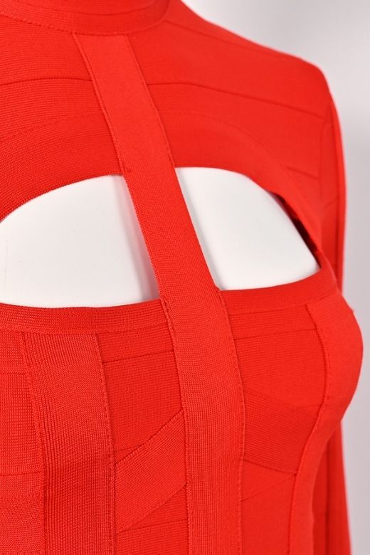 Woman wearing a figure flattering  Brooke Long Sleeve Bandage Dress - Lipstick Red BODYCON COLLECTION