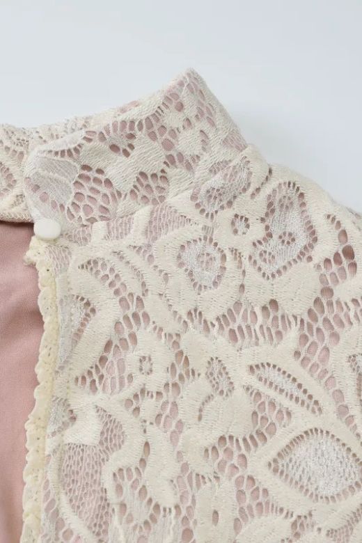 Woman wearing a figure flattering  Charlotte Long Sleeve Bodycon Mini Dress - Cream BODYCON COLLECTION