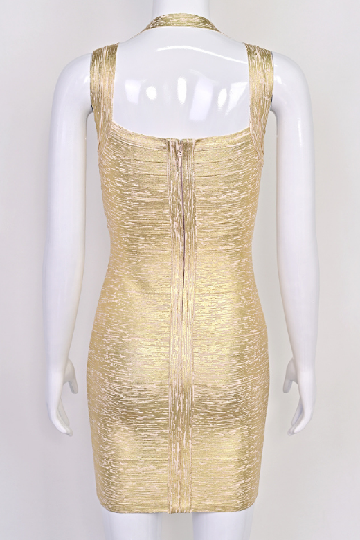 Woman wearing a figure flattering  Ciara Bandage Mini Dress - Gold BODYCON COLLECTION