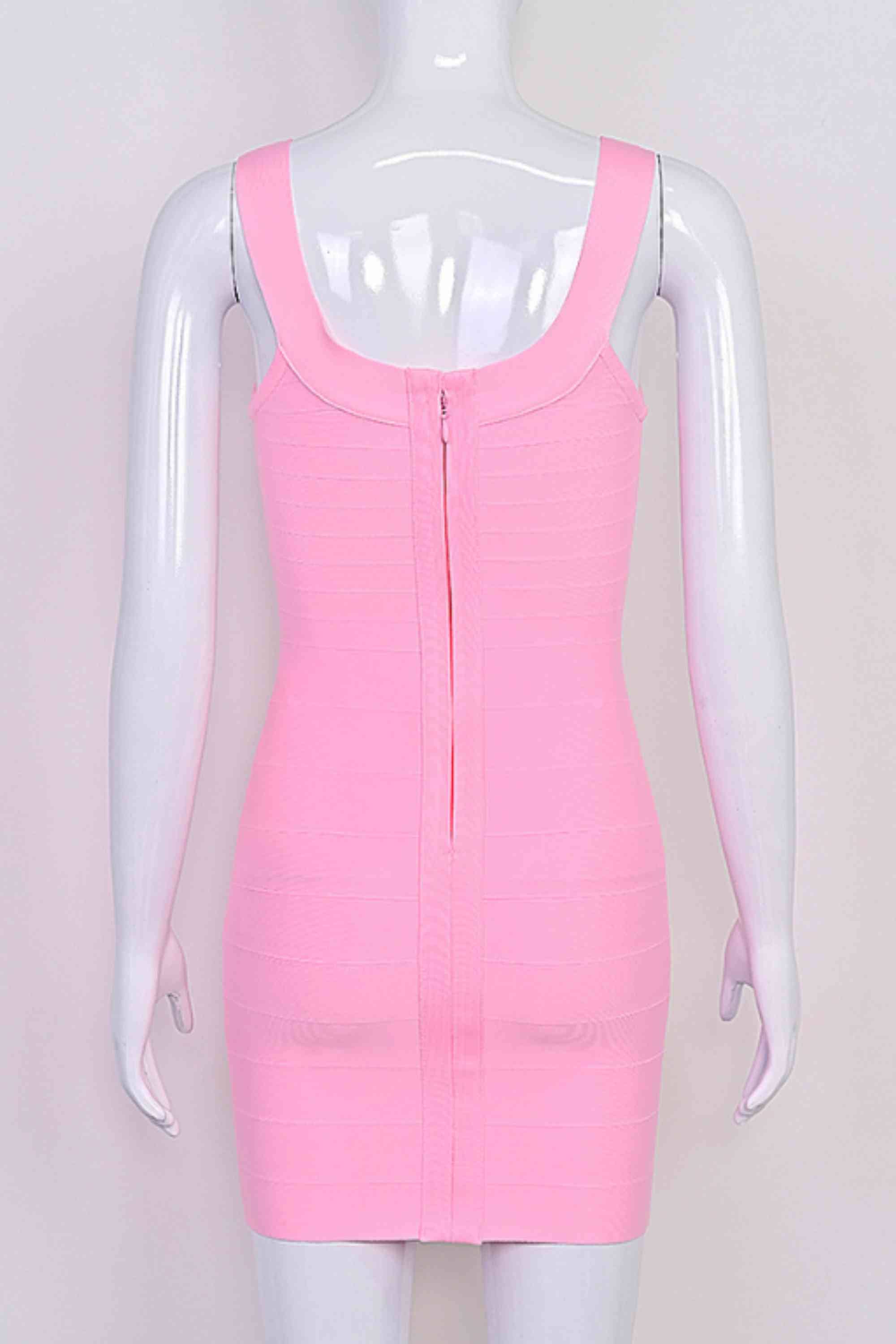 Woman wearing a figure flattering  Cindy Bandage Mini Dress - Blush Pink BODYCON COLLECTION Pty Ltd