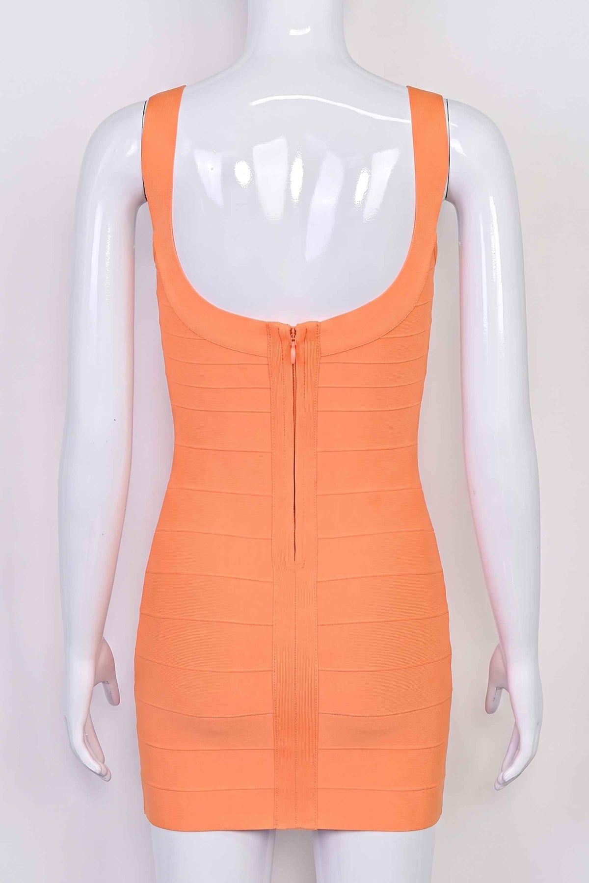 Woman wearing a figure flattering  Cindy Bandage Mini Dress - Coral BODYCON COLLECTION Pty Ltd