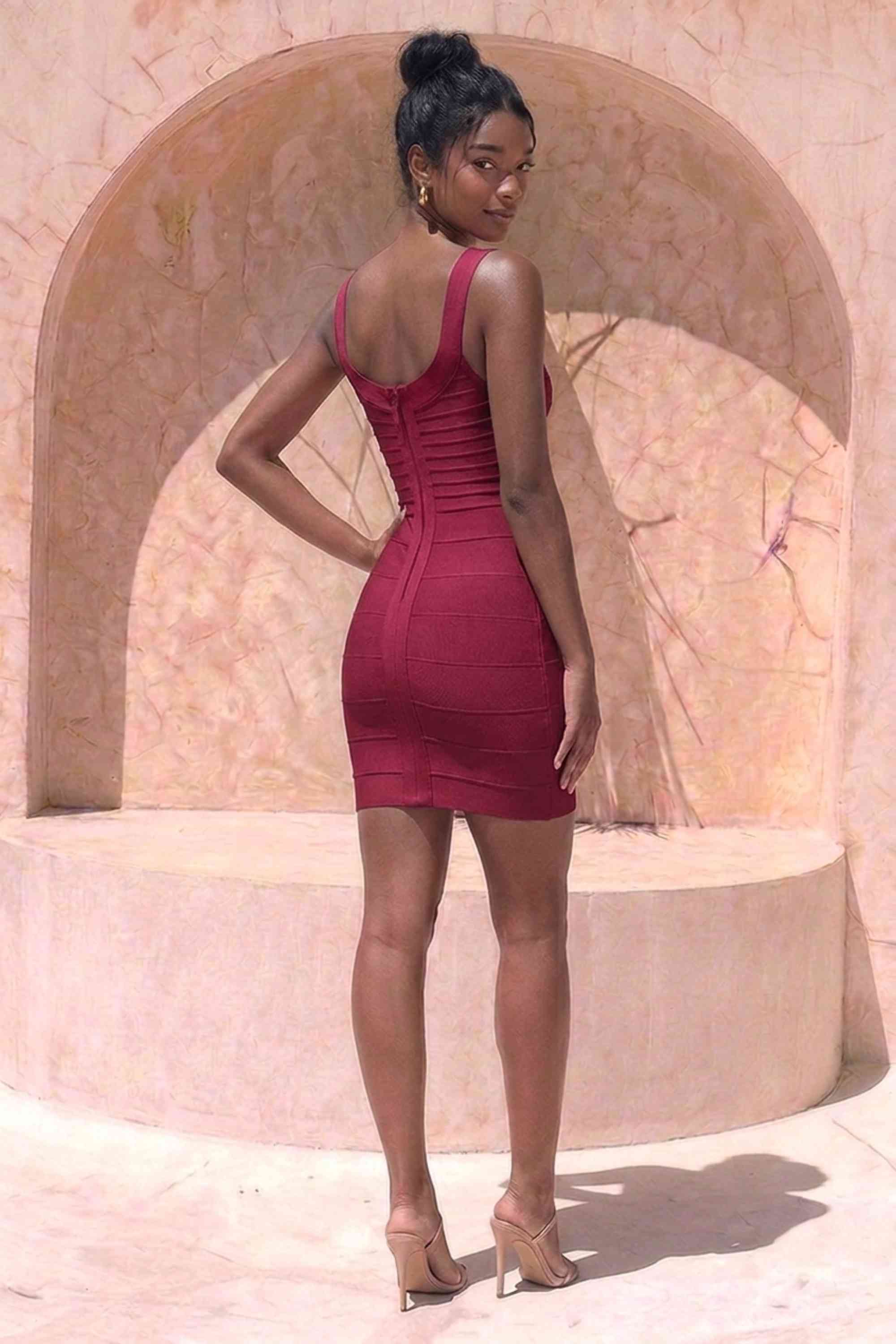 Woman wearing a figure flattering  Cindy Bandage Mini Dress - Red Wine BODYCON COLLECTION Pty Ltd