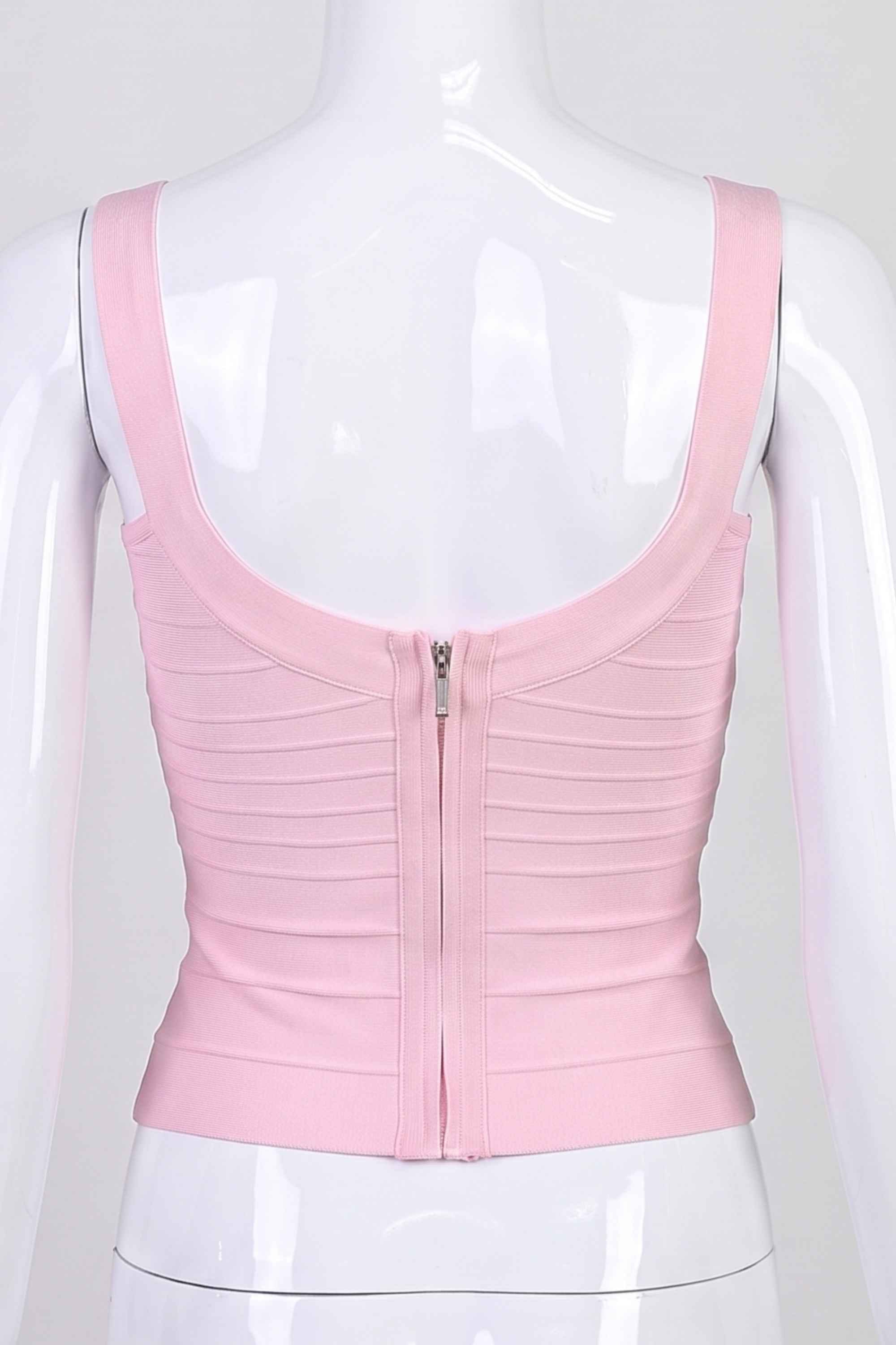 Woman wearing a figure flattering  Cindy Bandage Top - Dusty Pink BODYCON COLLECTION Pty Ltd
