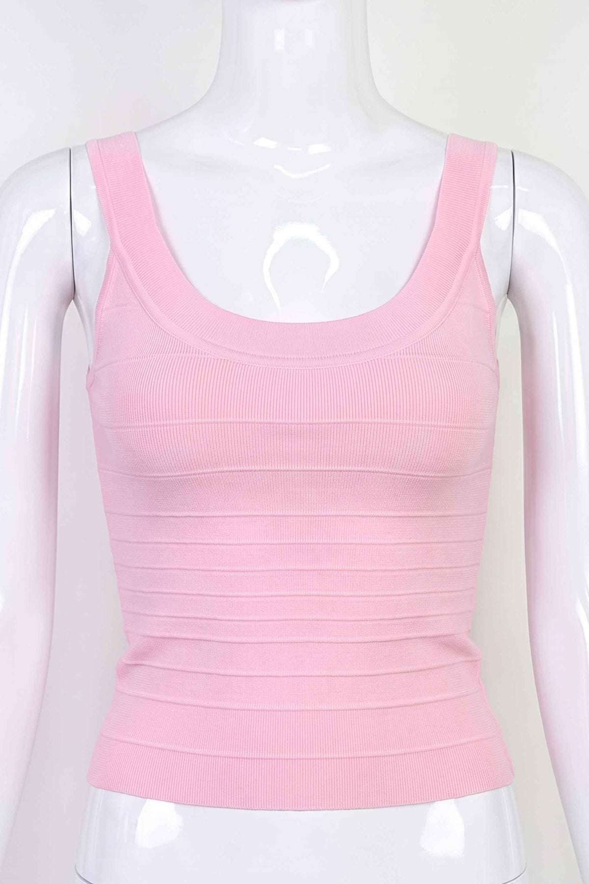 Woman wearing a figure flattering  Cindy Bandage Top - Dusty Pink BODYCON COLLECTION Pty Ltd