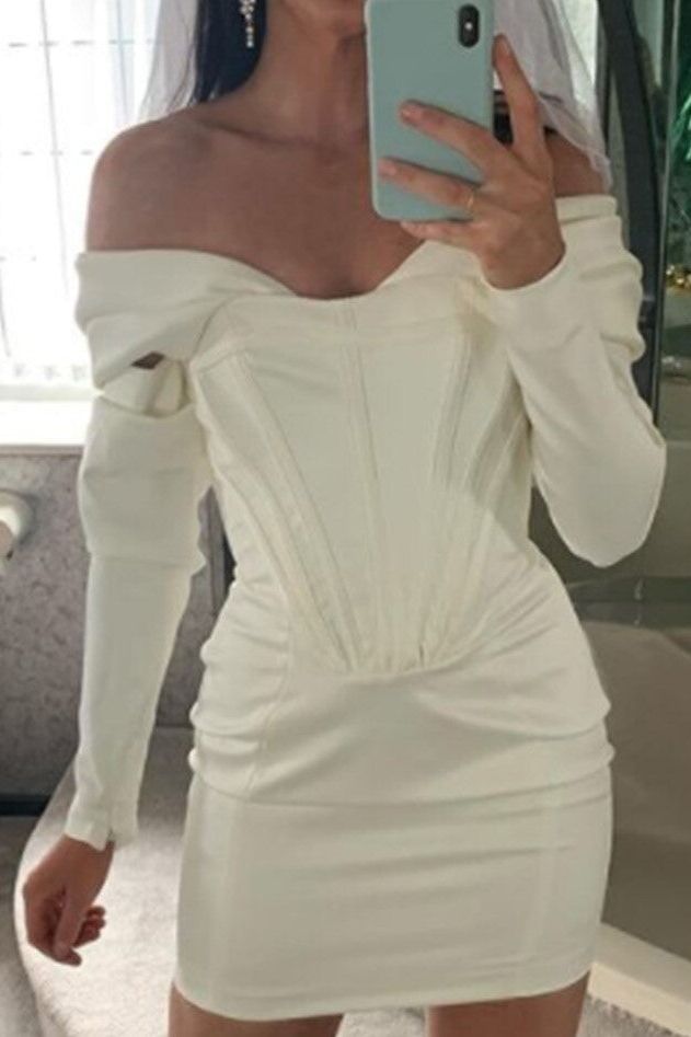 Woman wearing a figure flattering  Cosmo Long Sleeve Bodycon Mini Dress - Pearl White BODYCON COLLECTION