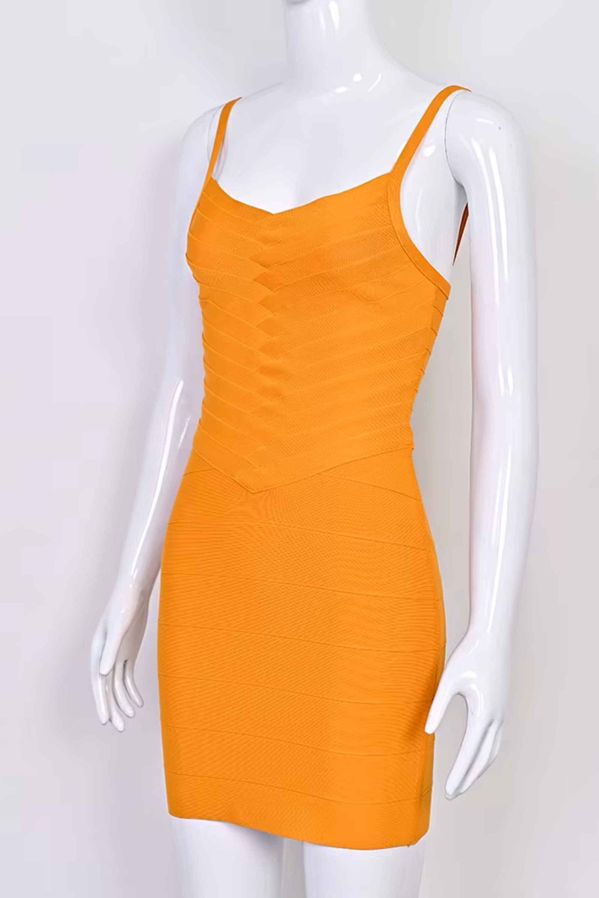 Woman wearing a figure flattering  Dom Bandage Mini Dress - Apricot Orange BODYCON COLLECTION Pty Ltd