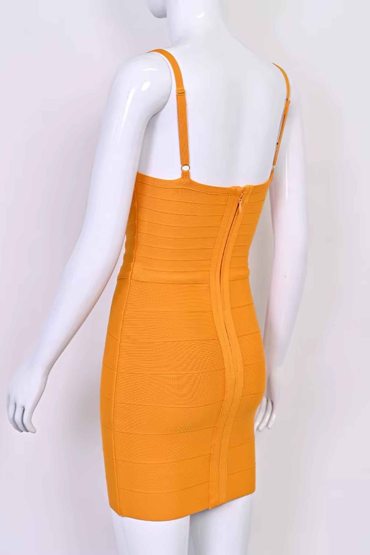 Woman wearing a figure flattering  Dom Bandage Mini Dress - Apricot Orange BODYCON COLLECTION Pty Ltd