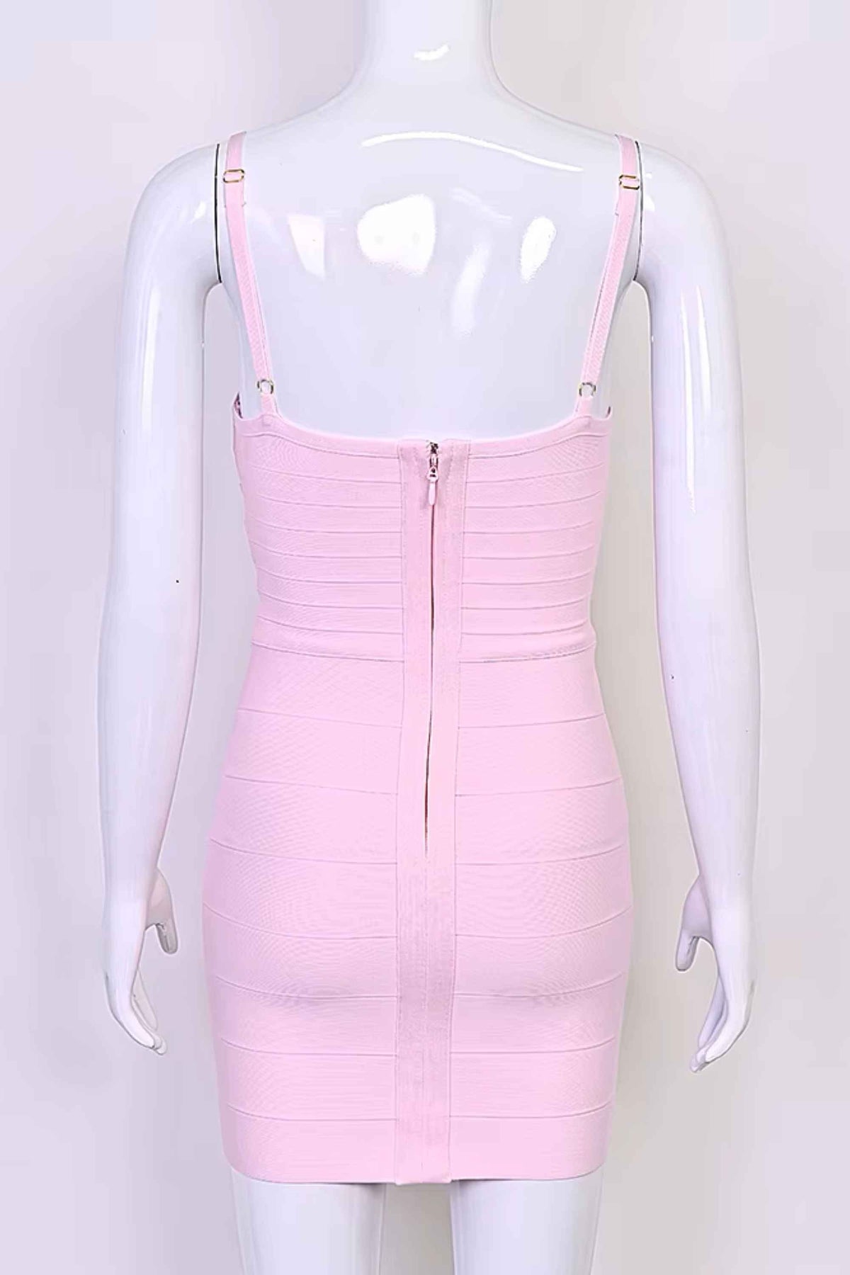 Woman wearing a figure flattering  Dom Bandage Mini Dress - Dusty Pink BODYCON COLLECTION Pty Ltd