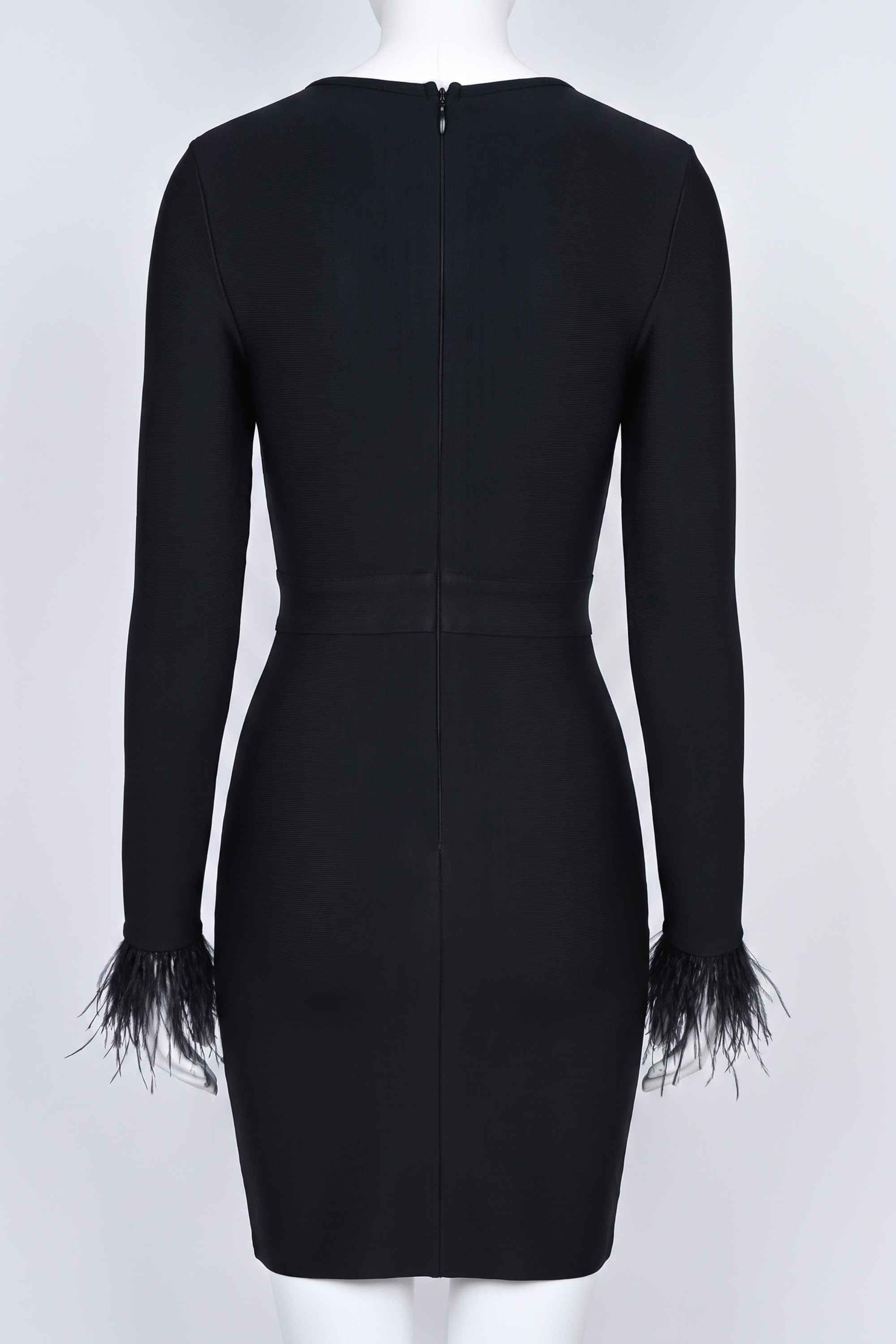 Woman wearing a figure flattering  Erin Long Sleeve Bandage Mini Dress - Classic Black BODYCON COLLECTION