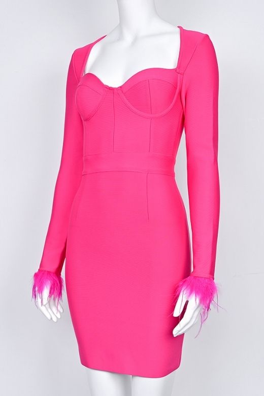 Woman wearing a figure flattering  Erin Long Sleeve Bandage Mini Dress - Hot Pink BODYCON COLLECTION