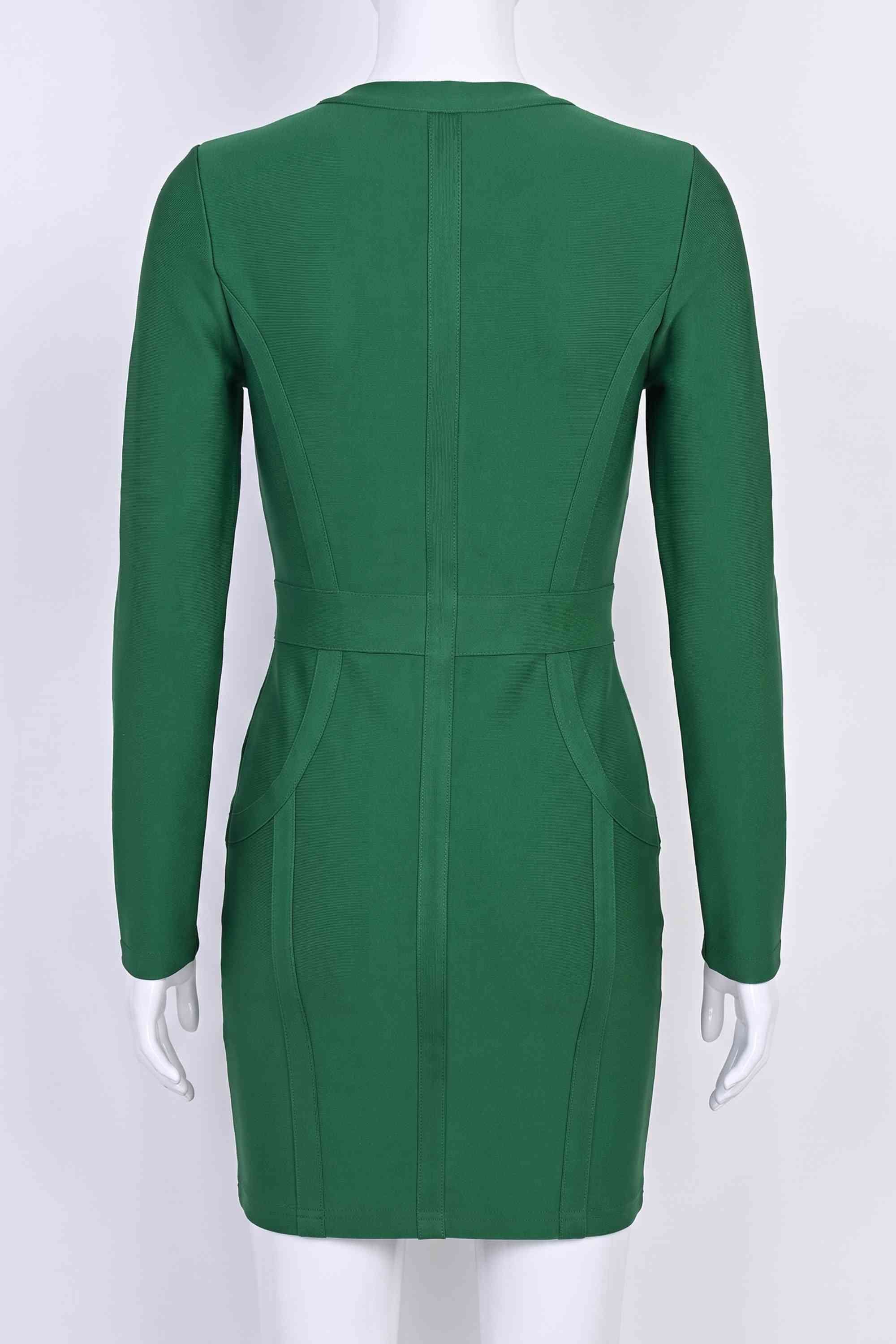 Woman wearing a figure flattering  Eva Long Sleeve Bandage Mini Dress - Emerald Green BODYCON COLLECTION