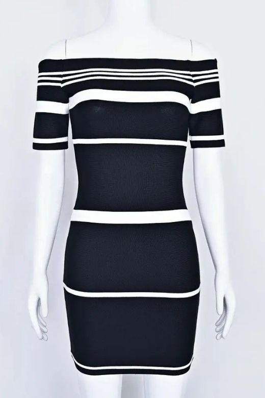 Woman wearing a figure flattering  Evelyn Bandage Mini Dress - Classic Black BODYCON COLLECTION Pty Ltd