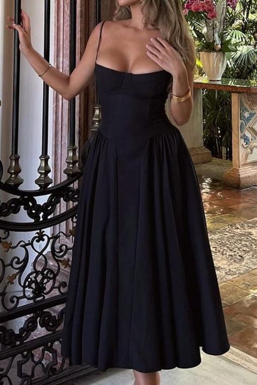 Woman wearing a figure flattering  Everly Day Midi Dress - Classic Black BODYCON COLLECTION