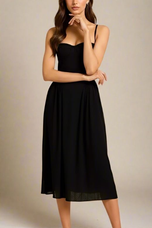 Woman wearing a figure flattering  Everly Midi Dress - Classic Black BODYCON COLLECTION
