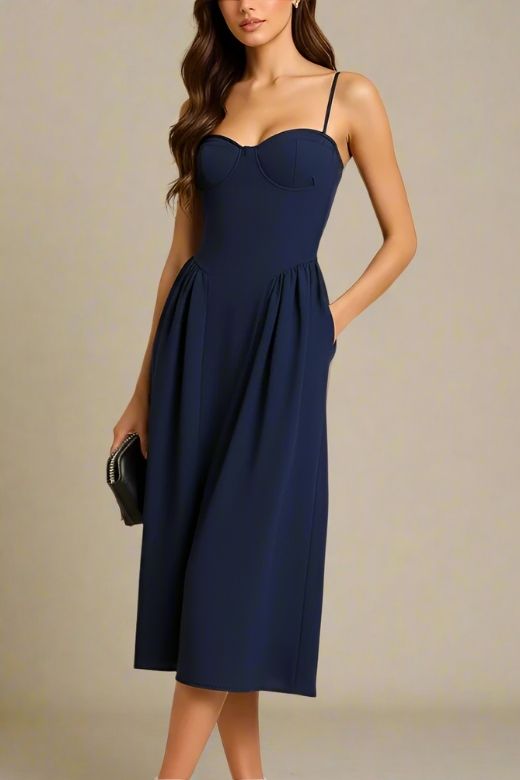 Woman wearing a figure flattering  Everly Midi Dress - Navy Blue BODYCON COLLECTION