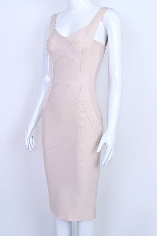 Woman wearing a figure flattering  Freya Bandage Dress - Beige BODYCON COLLECTION