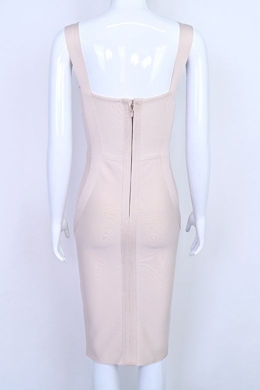 Woman wearing a figure flattering  Freya Bandage Dress - Beige BODYCON COLLECTION