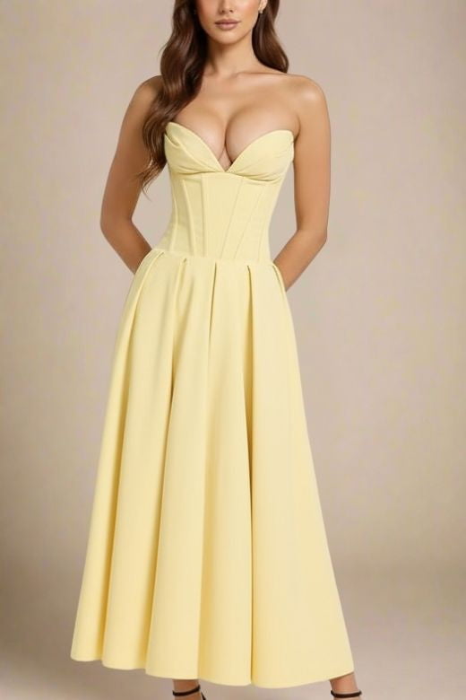 Woman wearing a figure flattering  Gabbi Bodycon Midi Dress - Sun Yellow BODYCON COLLECTION