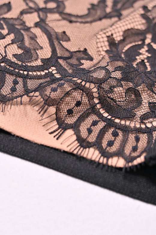 Woman wearing a figure flattering  Genevieve Bodycon Lace Midi Dress - Classic Black BODYCON COLLECTION