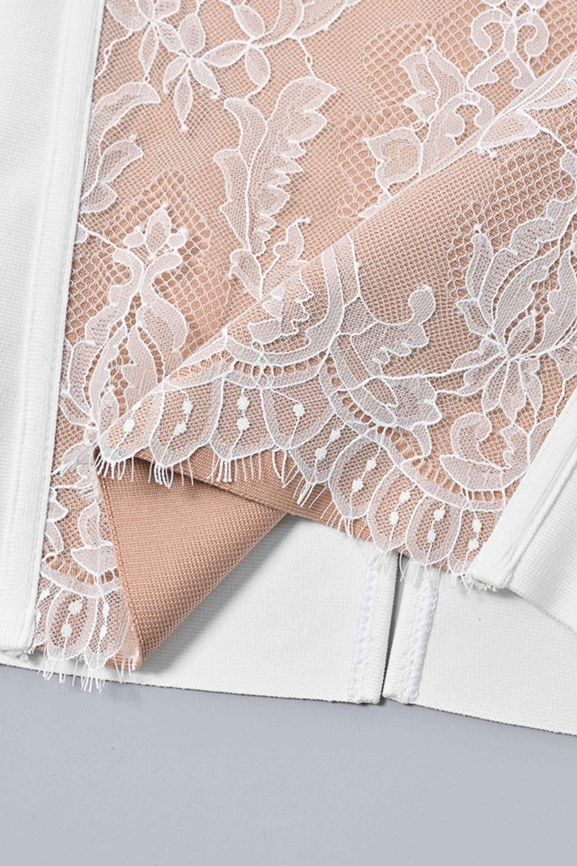 Woman wearing a figure flattering  Genevieve Bodycon Lace Midi Dress - Pearl White BODYCON COLLECTION