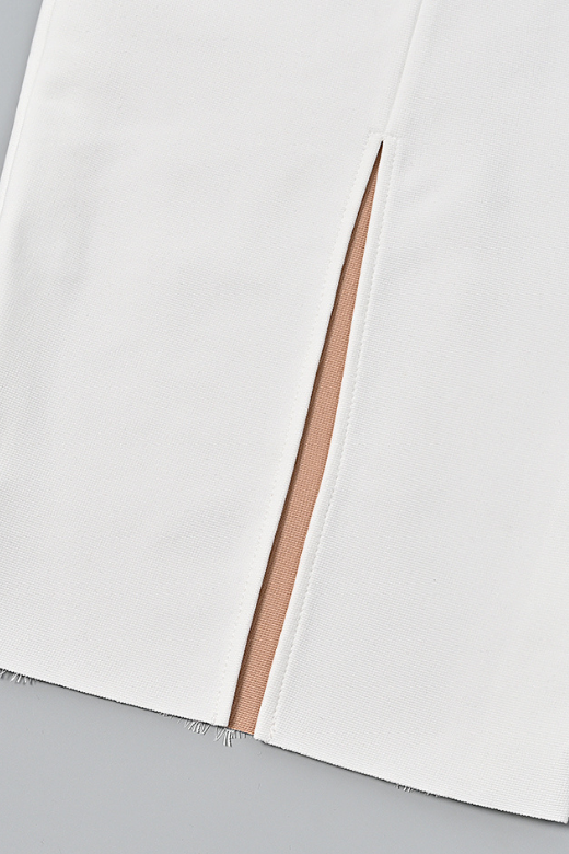 Woman wearing a figure flattering  Genevieve Bodycon Lace Midi Dress - White Pearl BODYCON COLLECTION