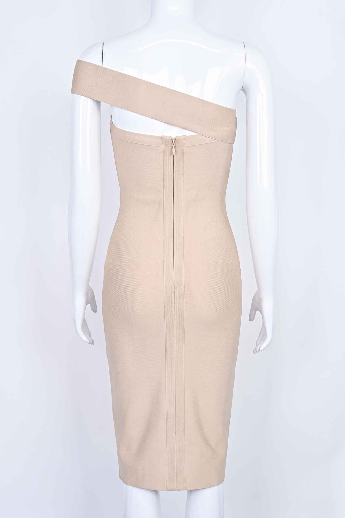 Woman wearing a figure flattering  Gianna Bandage Dress - Nude BODYCON COLLECTION