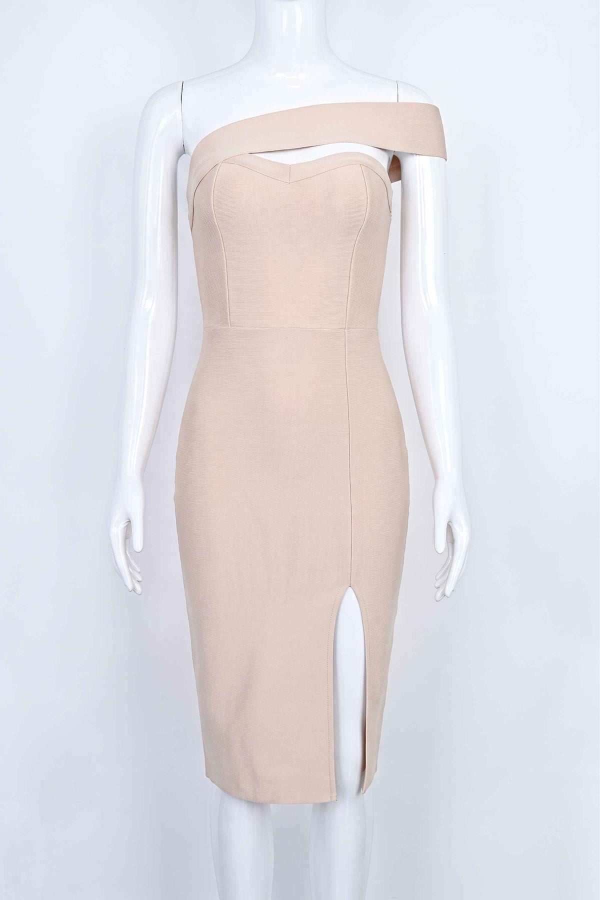 Woman wearing a figure flattering  Gianna Bandage Dress - Nude BODYCON COLLECTION