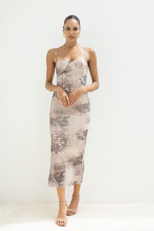 Woman wearing a figure flattering  Harmony Bodycon Midi Dress - Nude BODYCON COLLECTION