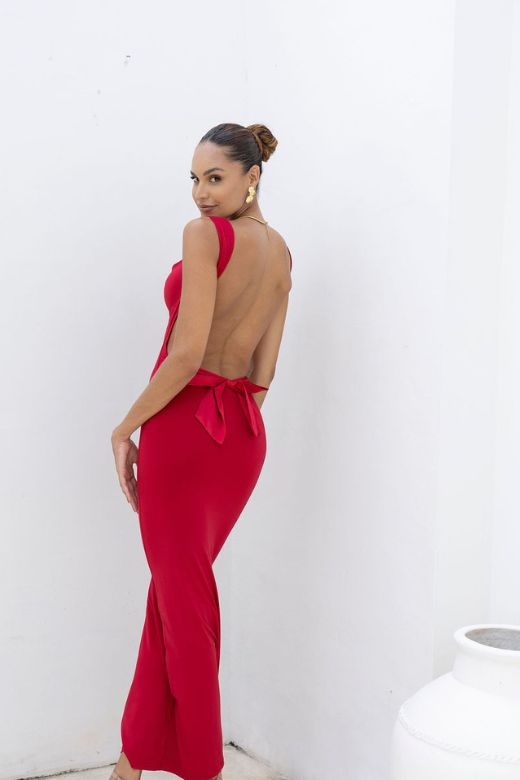 Woman wearing a figure flattering  Harper Bodycon Maxi Dress - Classic Black BODYCON COLLECTION