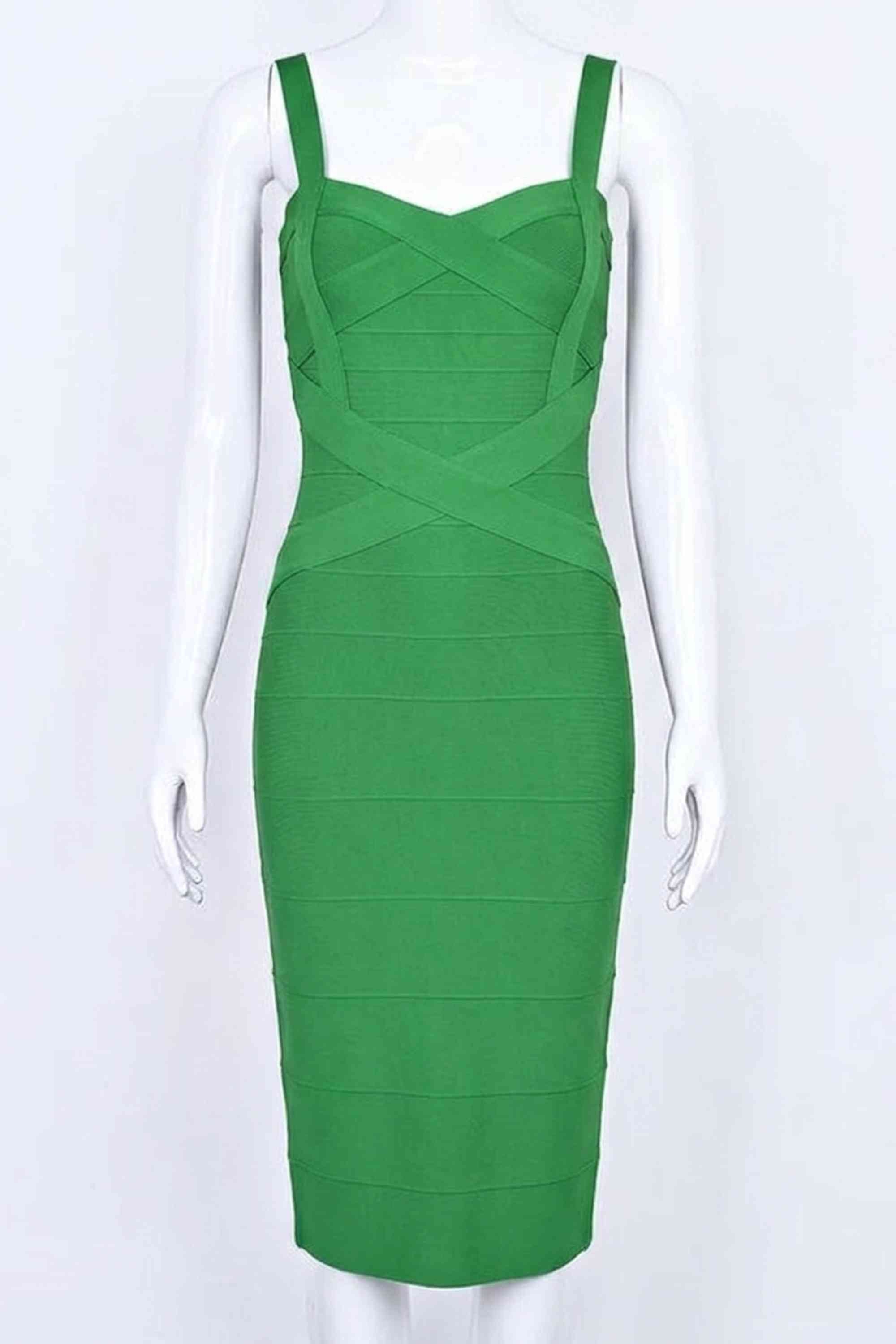 Woman wearing a figure flattering  Heidi Bandage Midi Dress - Emerald Green Bodycon Collection