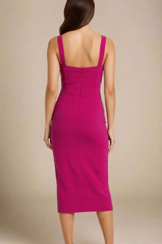 Woman wearing a figure flattering  Heidi Bandage Midi Dress - Magenta Pink Bodycon Collection