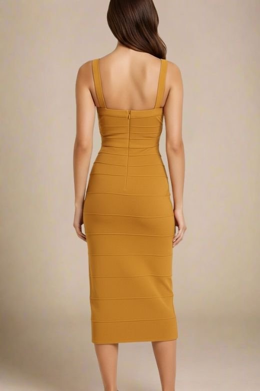 Woman wearing a figure flattering mustard yellow party dress Heidi Bandage Midi Dress - Mustard Yellow Bodycon Collection