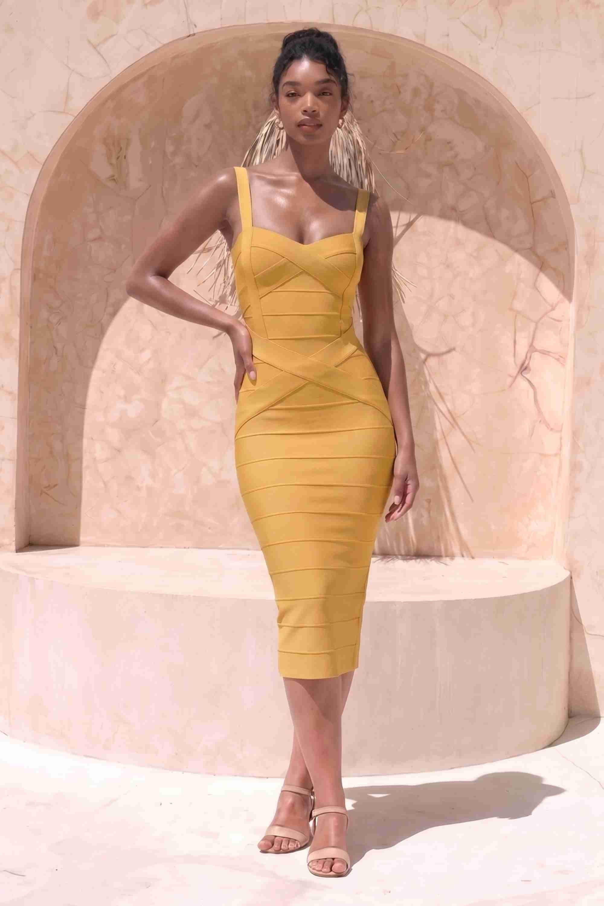 Woman wearing a mustard yellow party dress Heidi Bandage Midi Dress - Mustard Yellow Bodycon Collection